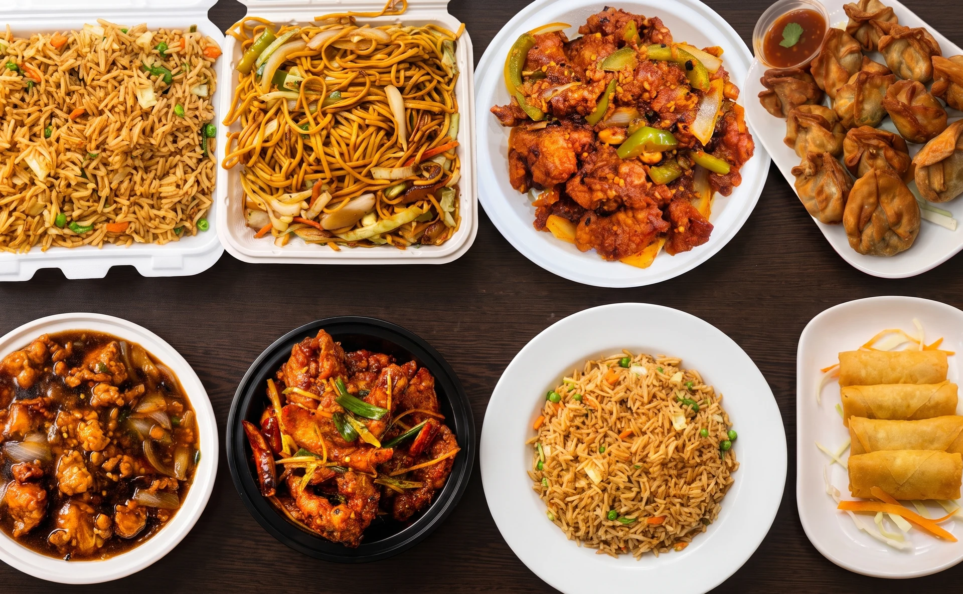 A spread of Hakka and Indo-Chinese dishes from the Asian Hakka Chinese & Indian Restaurant menu in downtown Brampton
